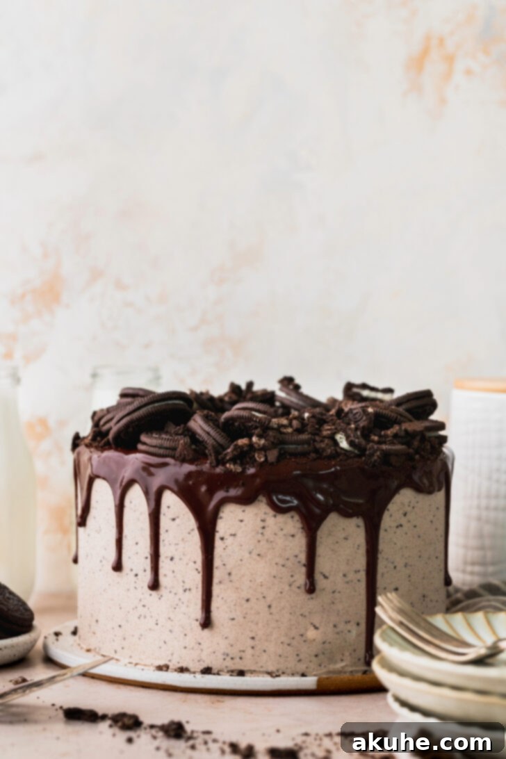 Decadent Oreo Dream Cake 10 Beautifully decorated layered Oreo cake with chocolate drip and whole Oreos on top