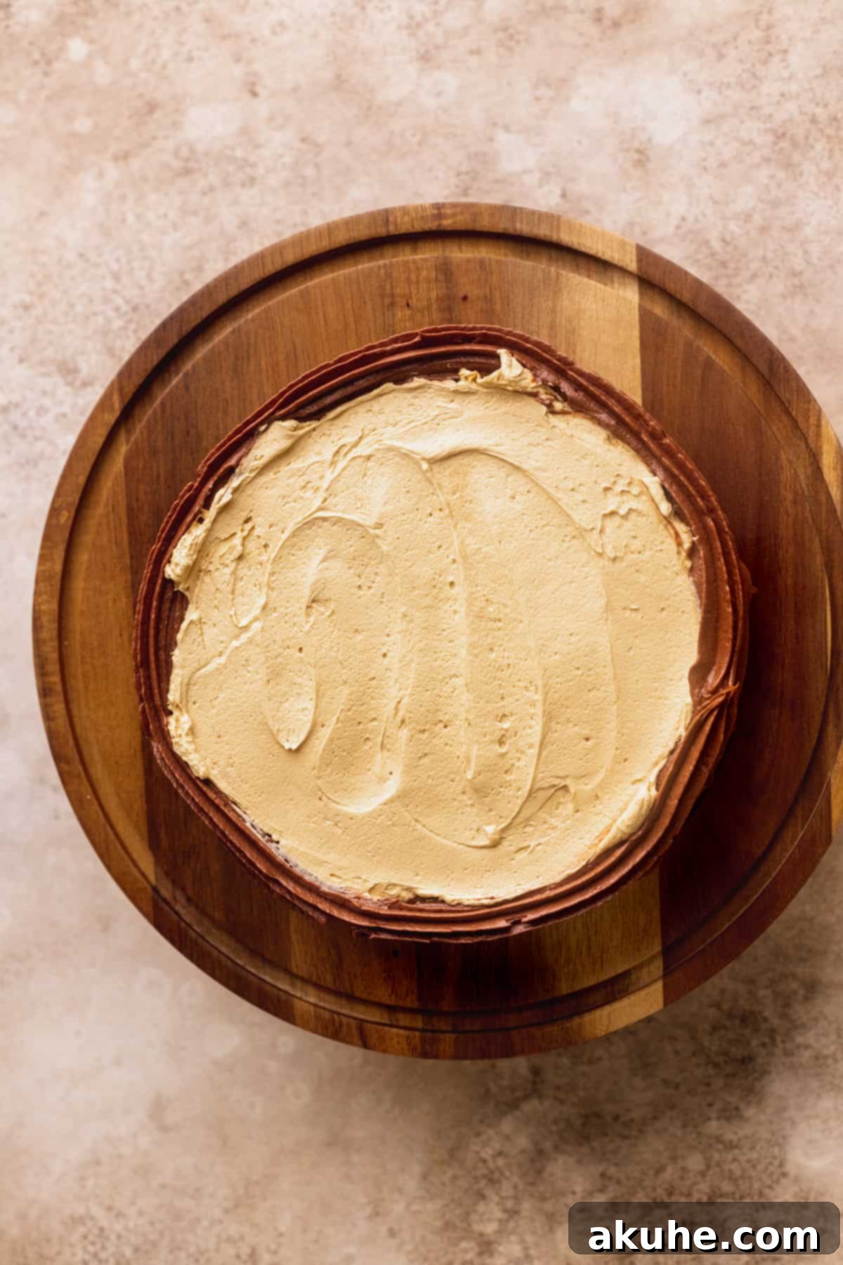 Decadent butterscotch ganache beautifully spread over a cake layer, creating a delicious filling.