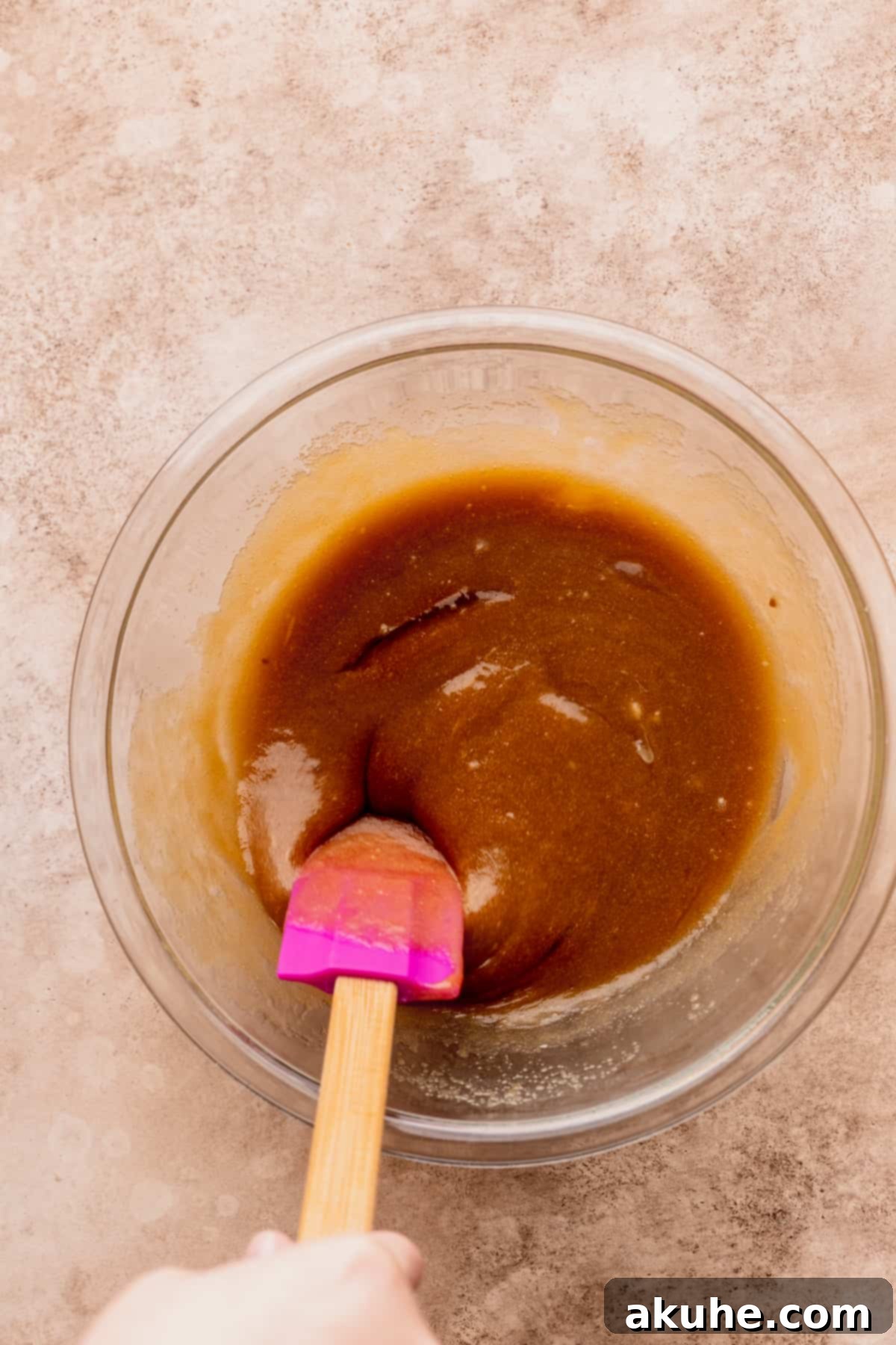 Wet ingredients in a mixing bowl before adding dry ingredients.
