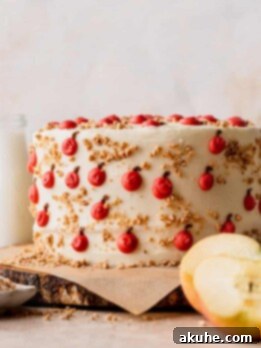 Irresistible Apple Toffee Cake 13 Apple toffee layered cake on a wooden board.