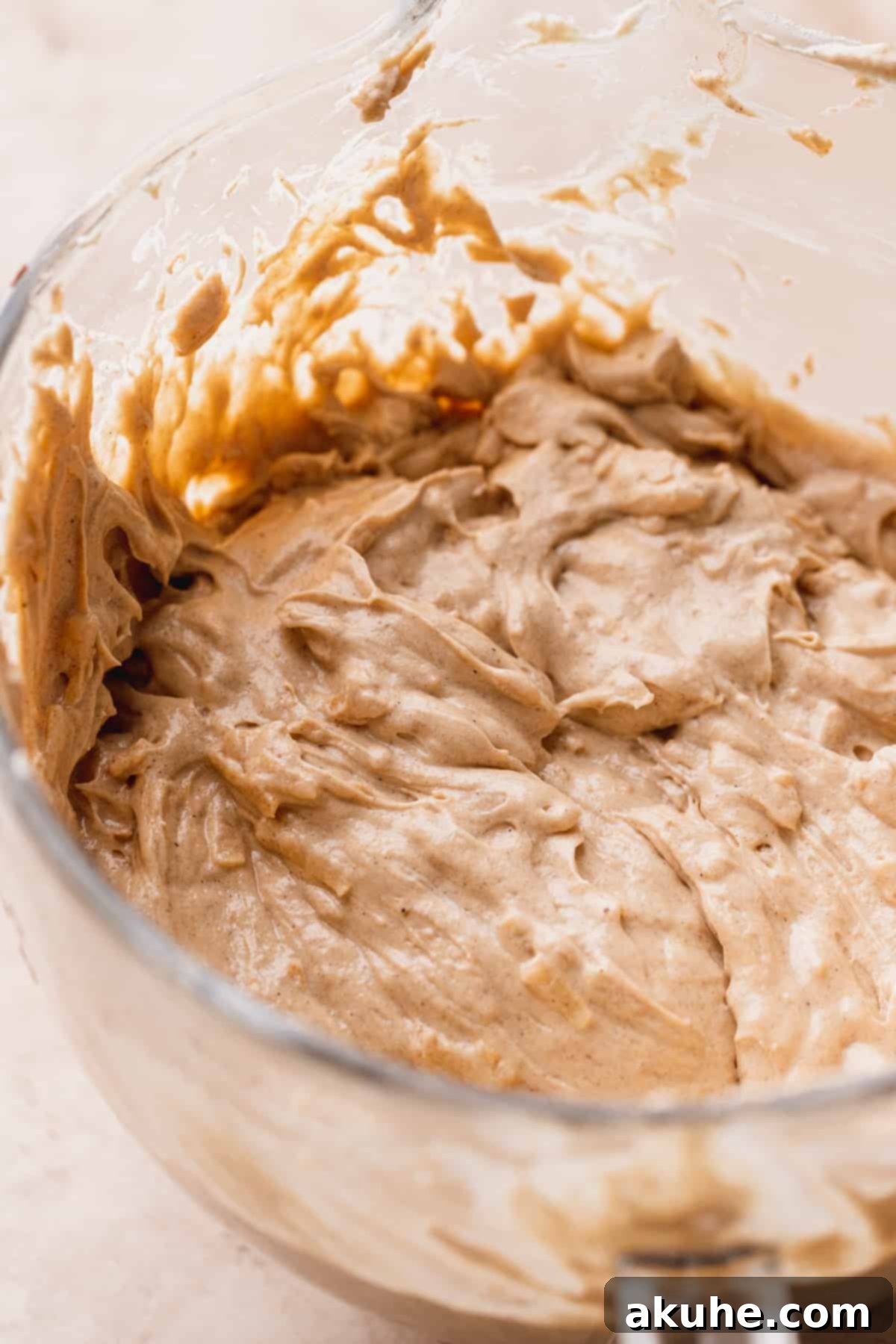 Irresistible Apple Toffee Cake 8 Fully mixed cake batter with integrated dry ingredients, ready for baking.