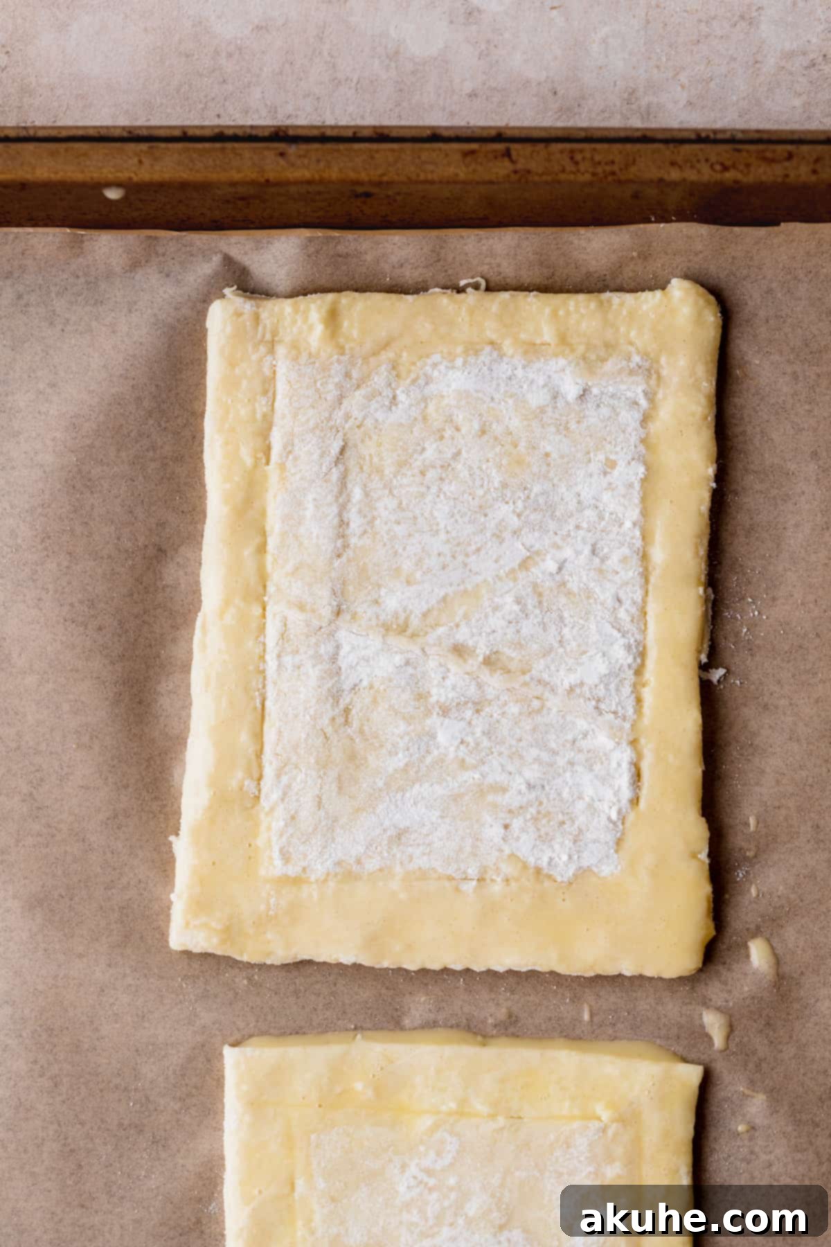 Indulgent Chocolate Cream Cheese Danish 5 Puff pastry on a cookie sheet,