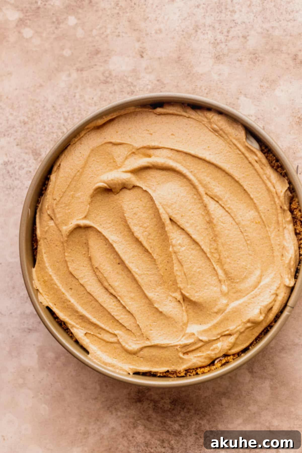 Marbled No Bake Pumpkin Cheesecake 12 Layer of pumpkin batter on top of cheesecake.