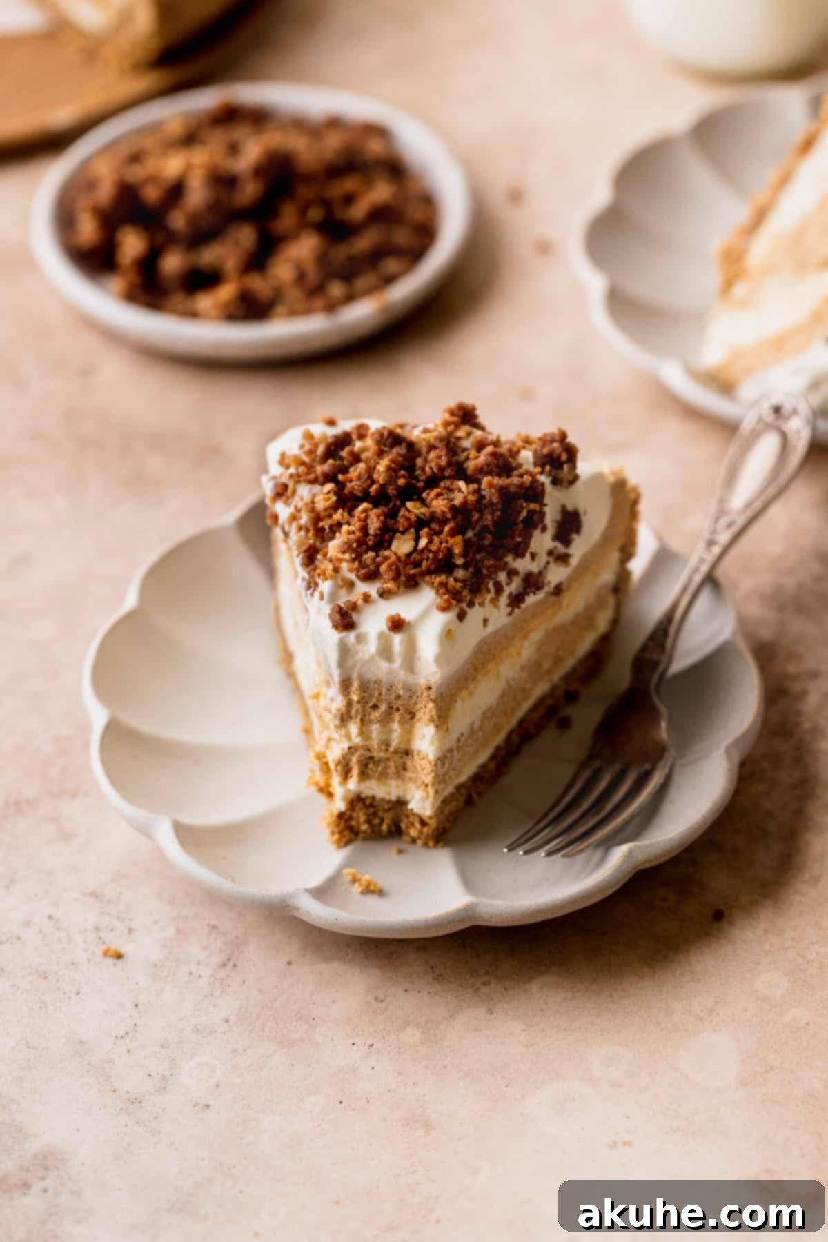 Marbled No Bake Pumpkin Cheesecake 15 Slice of cheesecake on a plate.