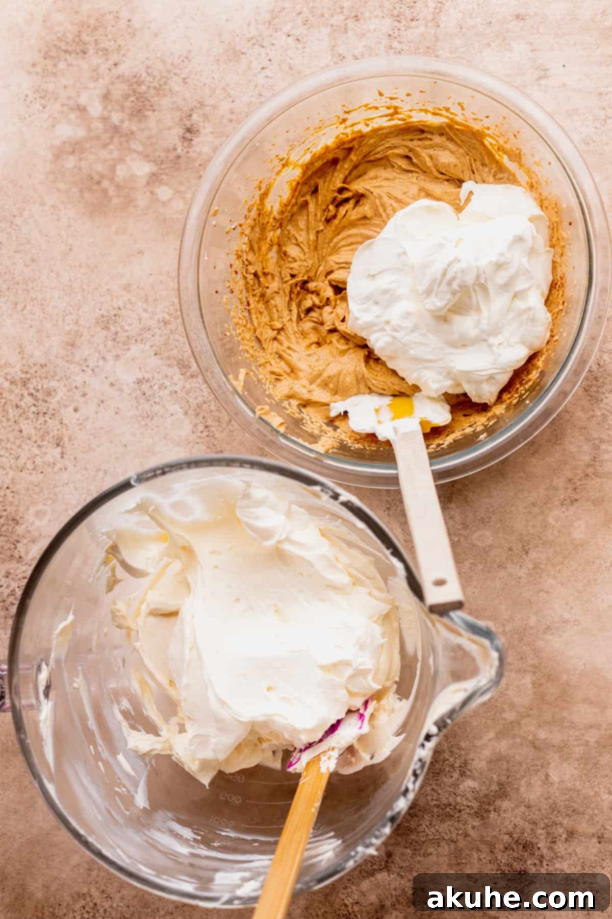 Marbled No Bake Pumpkin Cheesecake 7 Whipped cream on top of cheesecake batter.