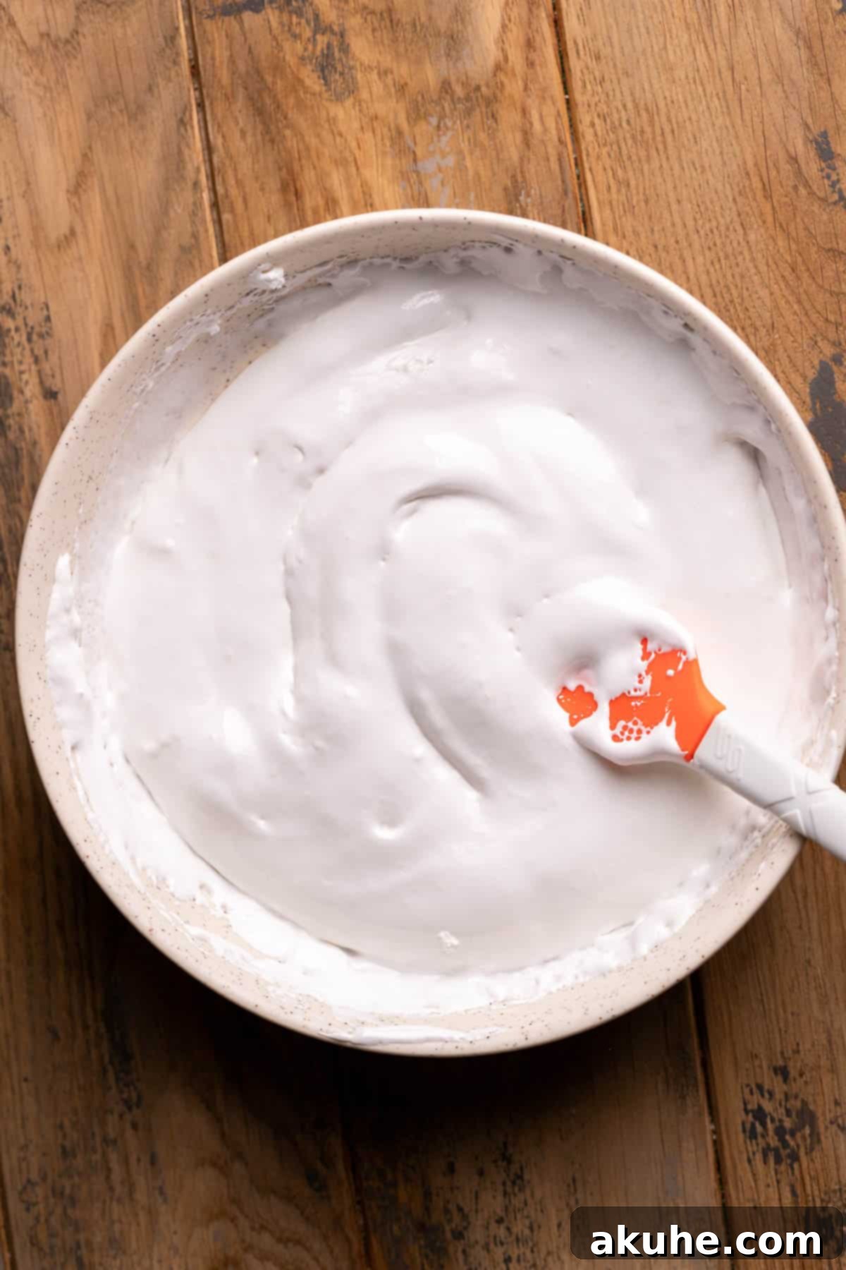 Ultimate Smores Cake 8 Smooth marshmallow creme in a bowl, ready for use.