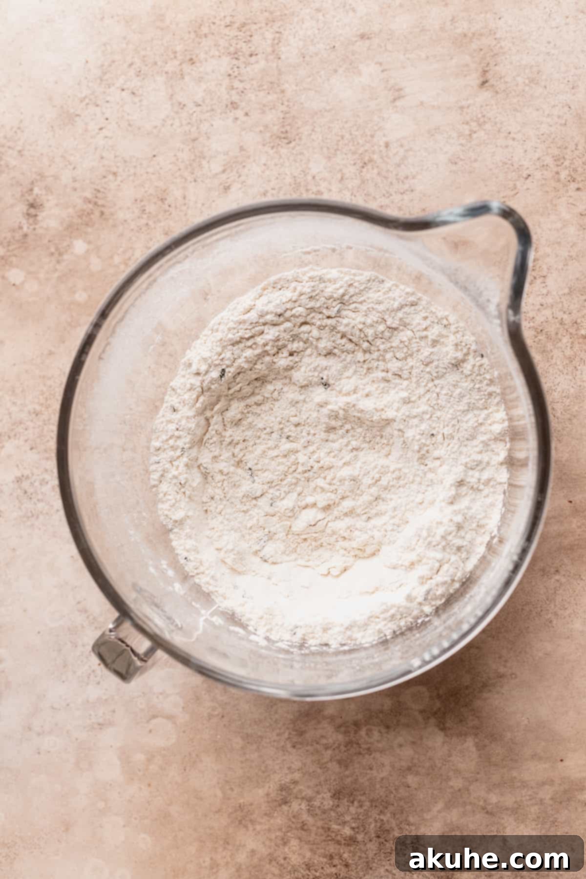 Dry ingredients in a glass bowl.