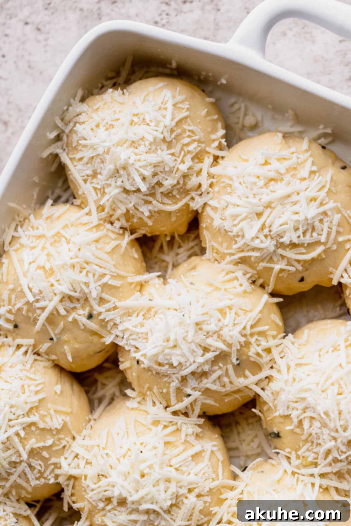 Parmesan cheese on top of dough.