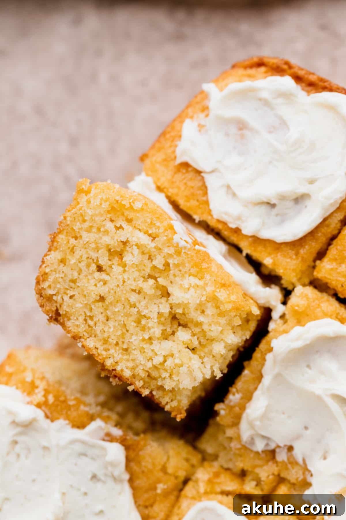 Buttery Honey Cornbread 11 A piece of honey butter cornbread on its side.