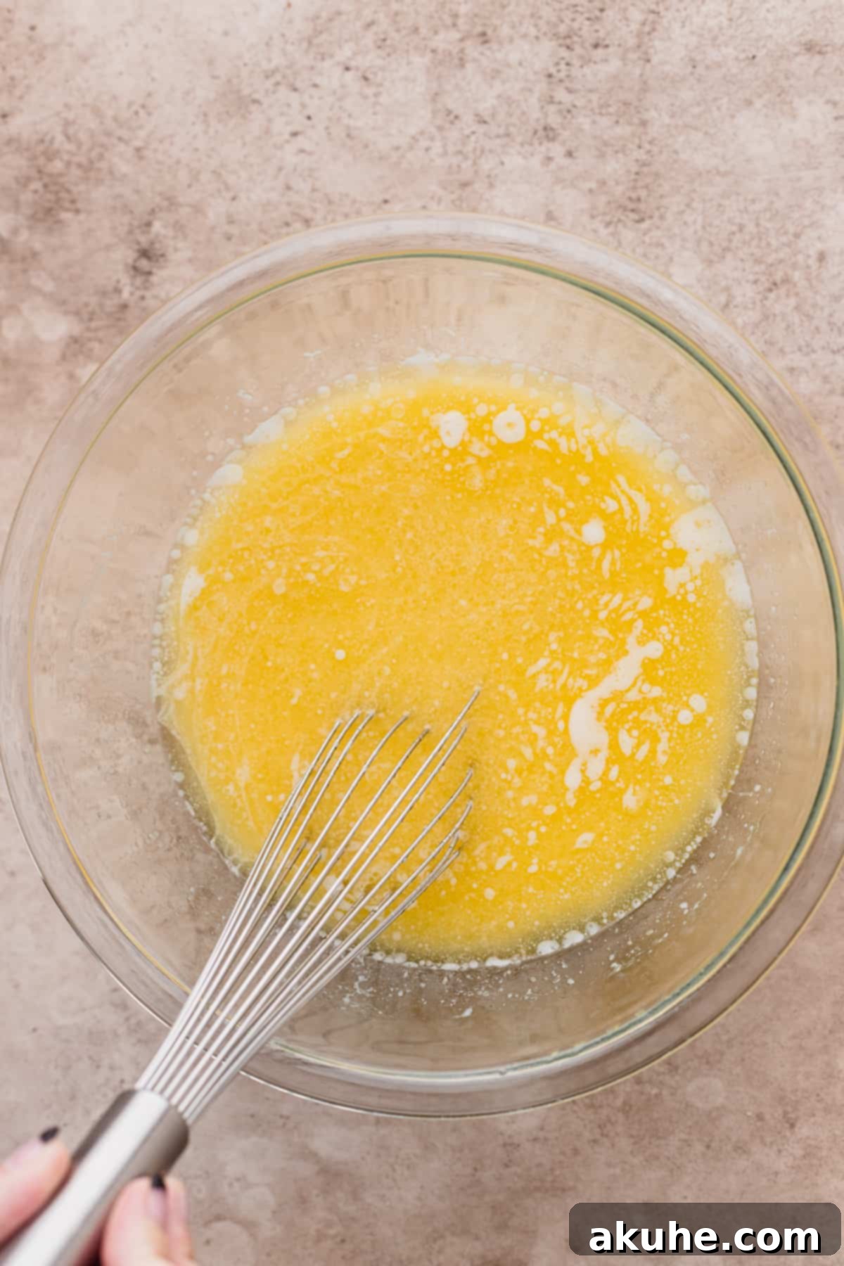 Buttery Honey Cornbread 4 Wet ingredients in a bowl.