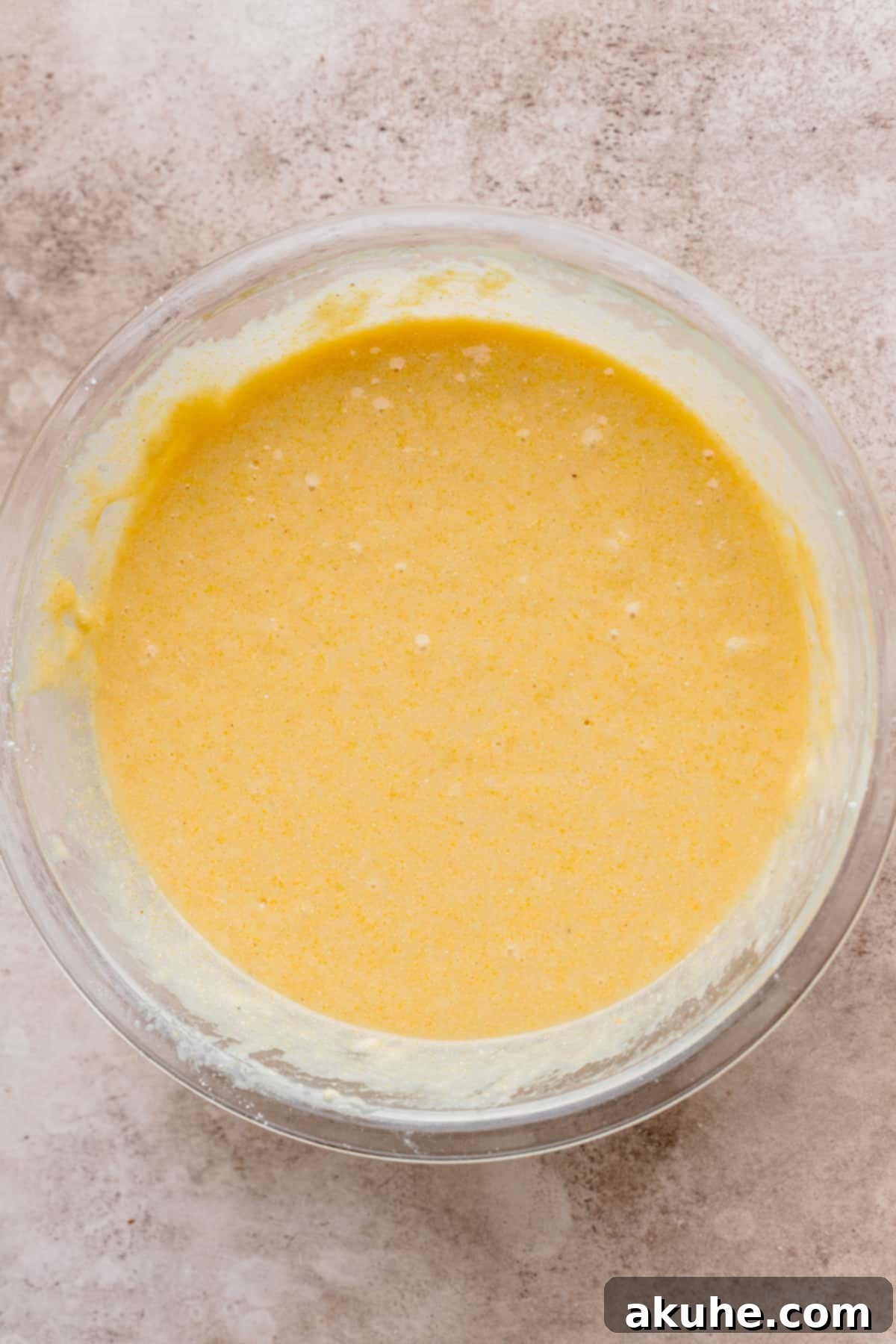 Buttery Honey Cornbread 6 Batter in a glass bowl.