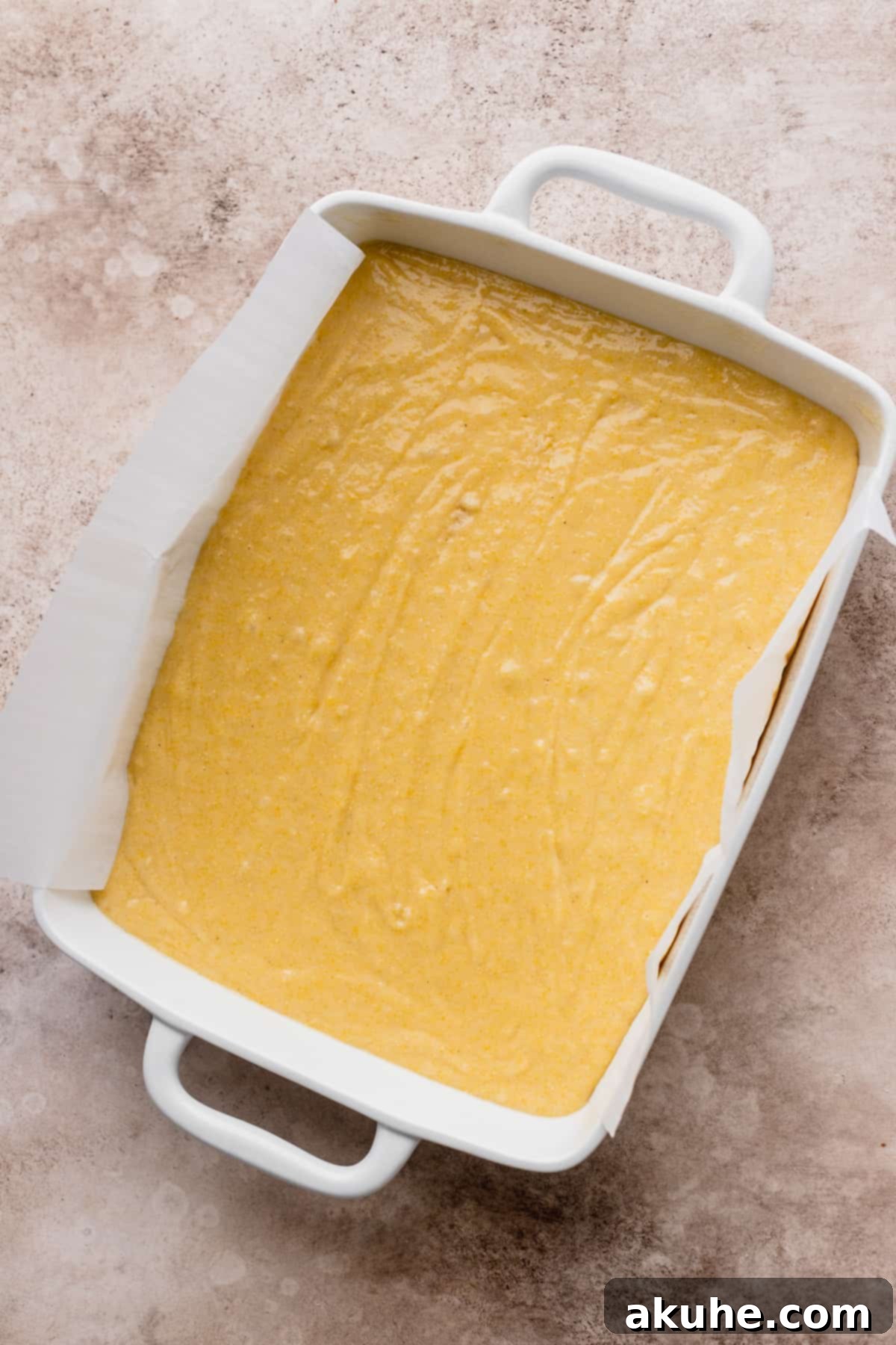 Buttery Honey Cornbread 7 Batter in a pan.