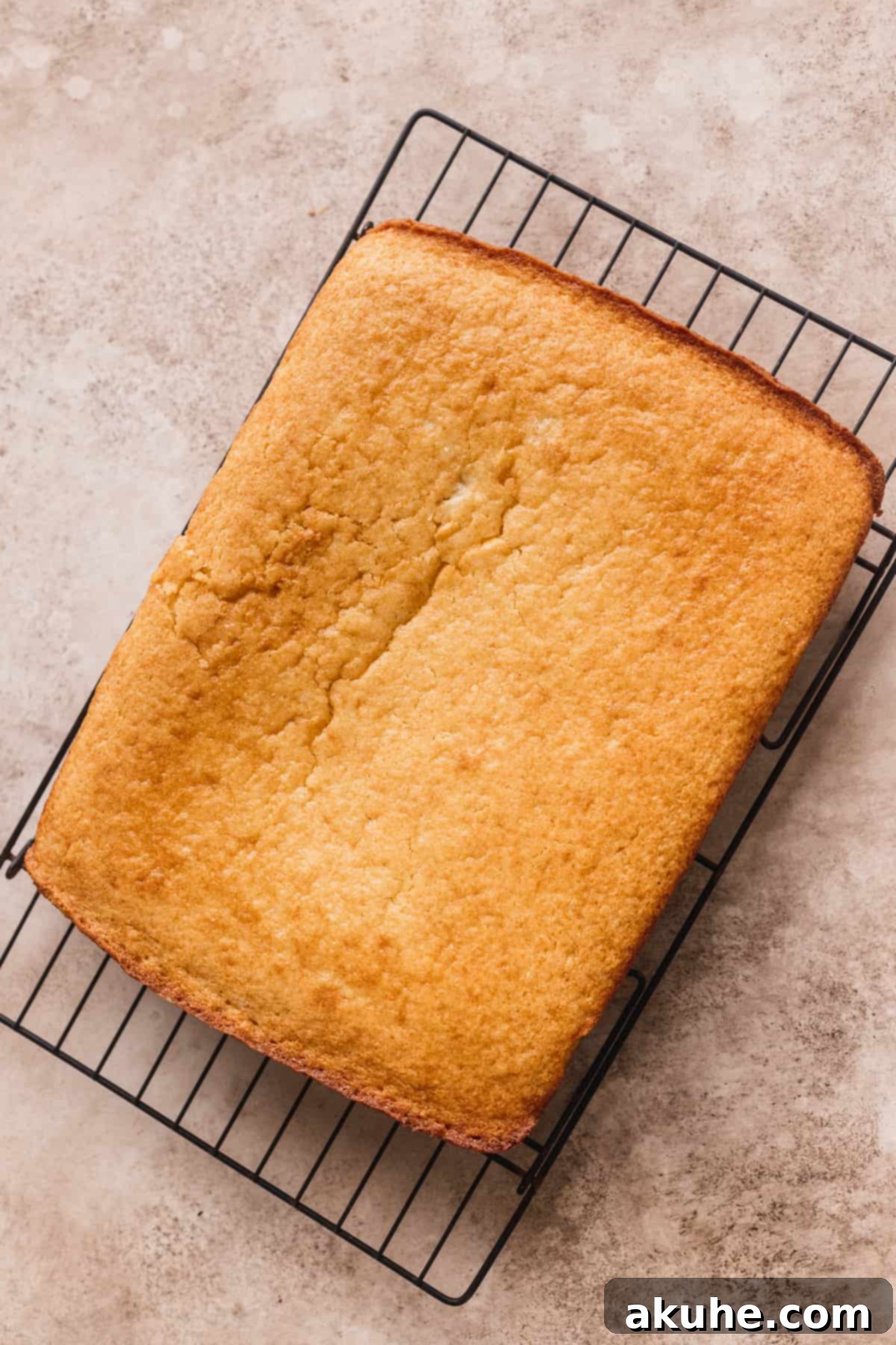 Buttery Honey Cornbread 8 Cornbread on a wire rack.