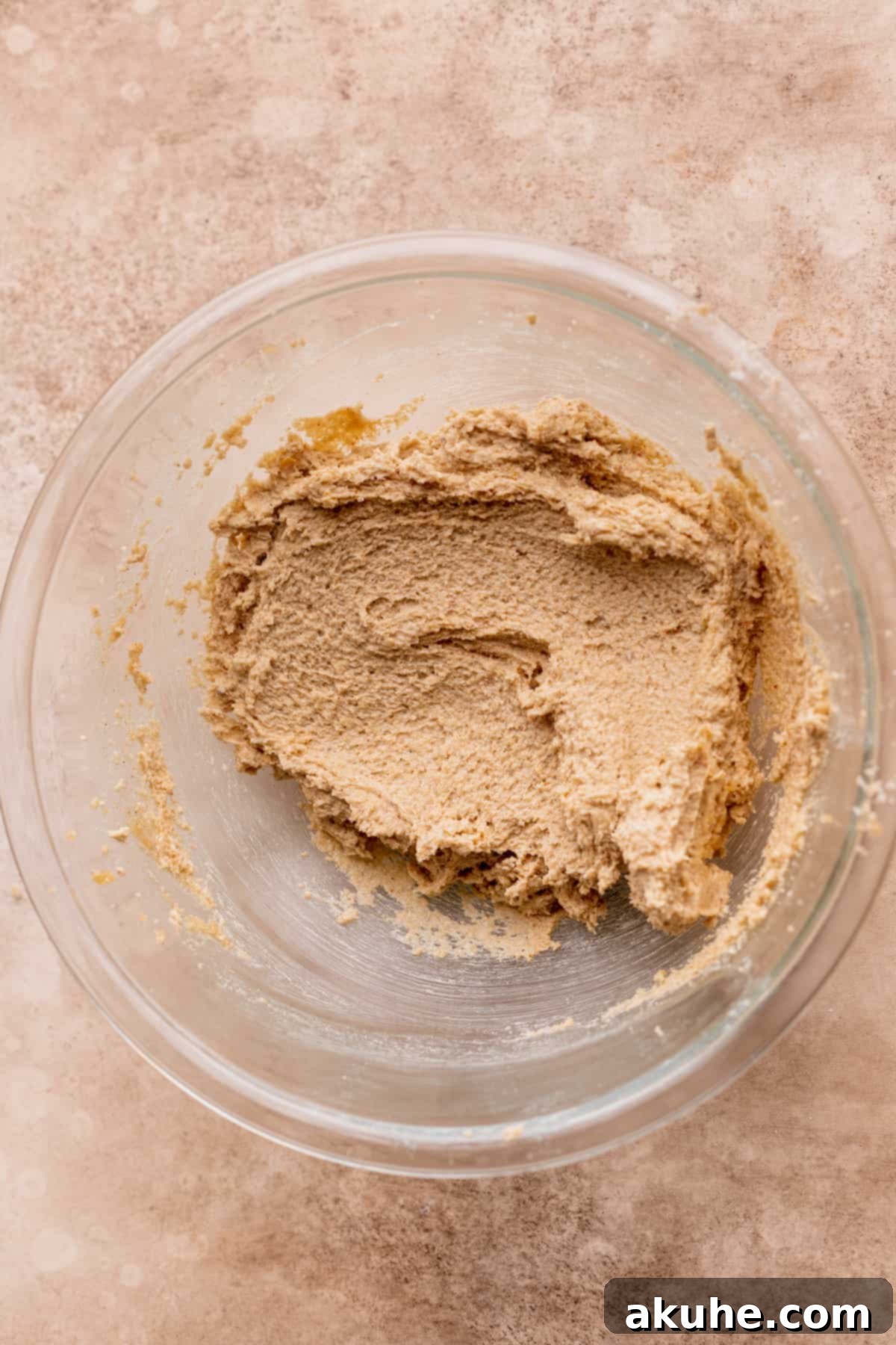 Decadent White Chocolate Toffee Cookies 6 Close-up of creamed butter and sugars in a mixing bowl.