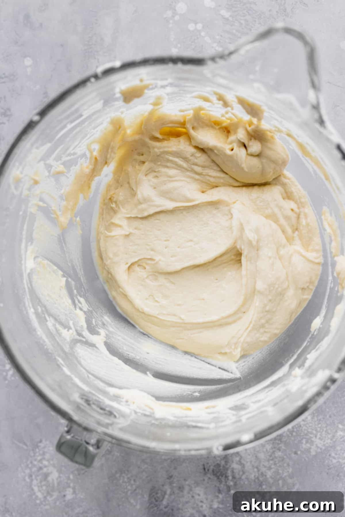 Decadent White Chocolate Cupcakes 6 Smooth and ready-to-bake cupcake batter in a clear glass bowl.