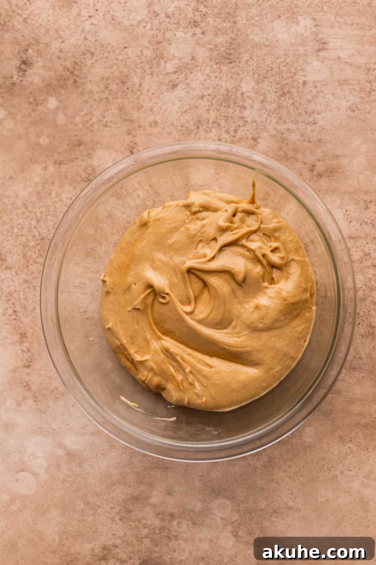 Rich, creamy cookie butter filling in a bowl, showing its smooth texture.