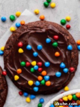 Deep Space Fudge Cookies 14 Cosmic brownie cookie on parchment paper.