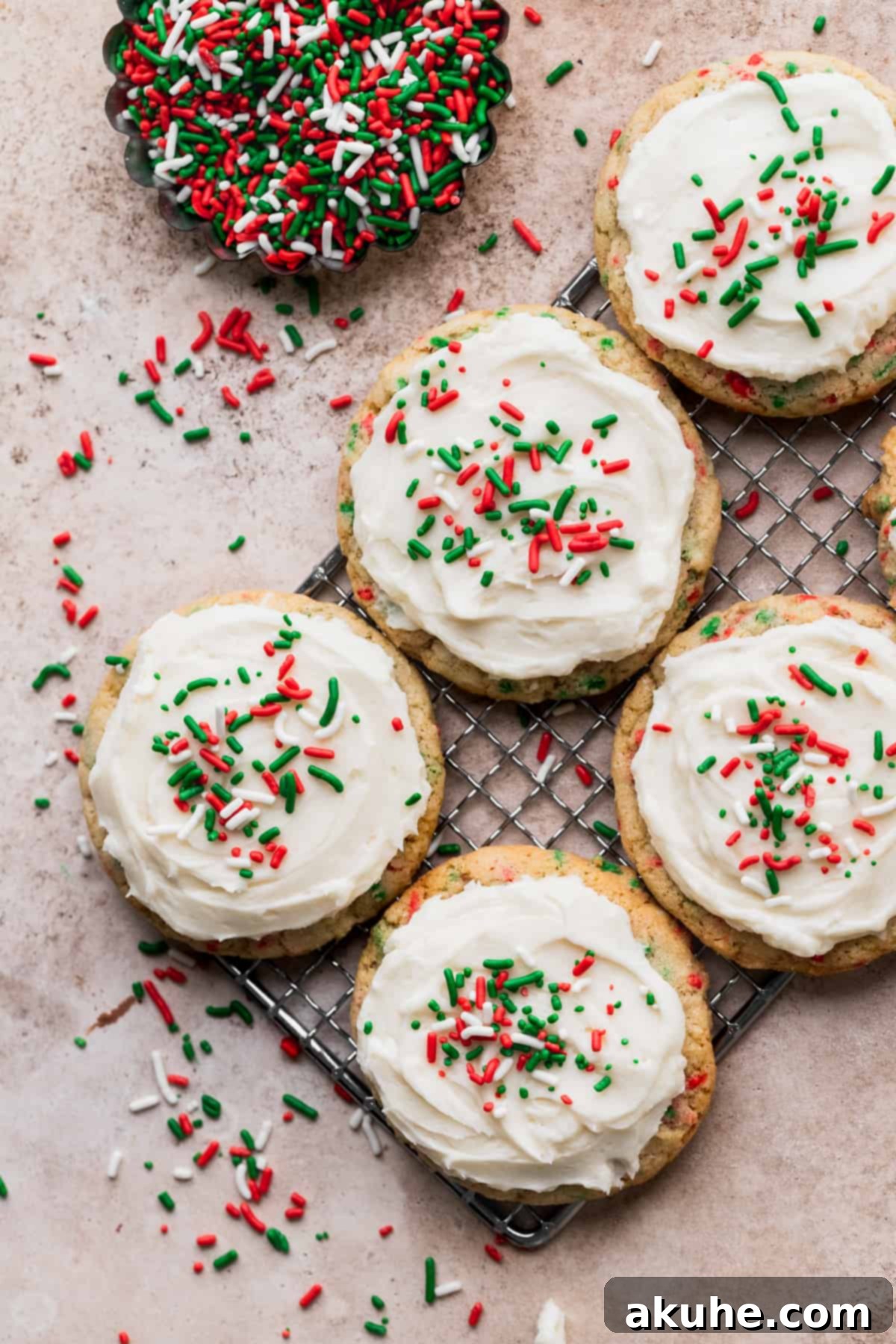 Merry & Bright Sprinkle Cookies 10 Six freshly baked Christmas sprinkle cookies on a wire rack, cooling down.