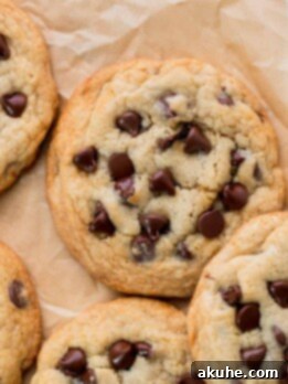 Just Enough Chocolate Chip Bliss 11 Small batch chocolate chip cookies on a parchment paper.