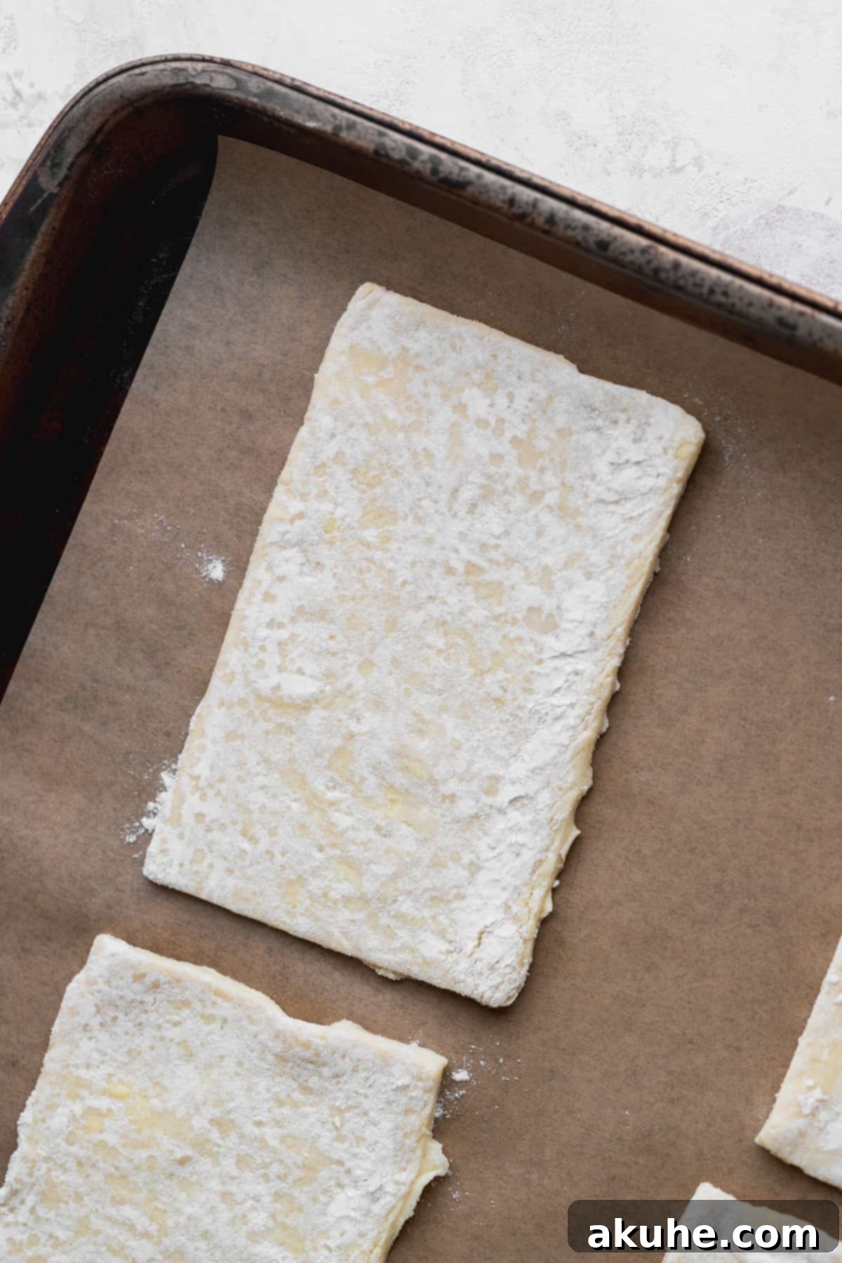 Ultimate Chocolate Cookie Dough Pop Tarts 7 Puff pastry rectangle laid out on parchment paper.