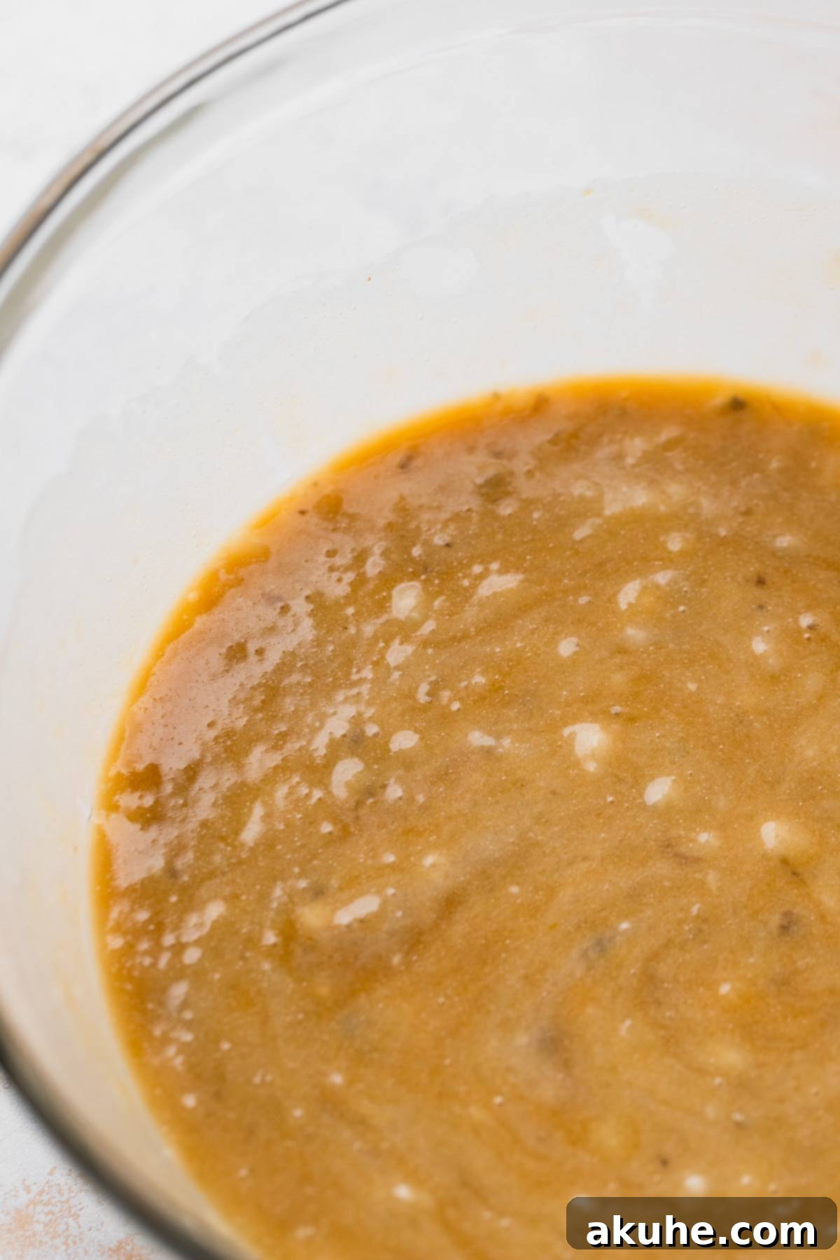 Irresistible Cinnamon Swirl Banana Bread 4 Wet ingredients in a bowl.