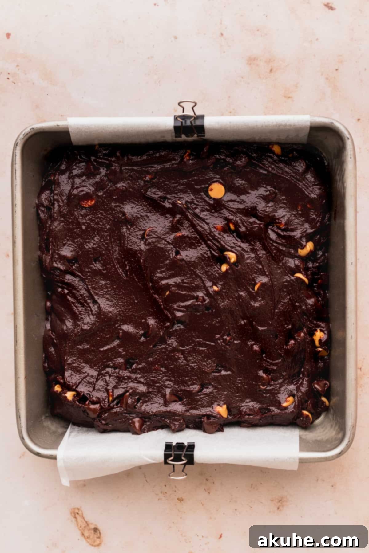 Brownie batter in a pan.