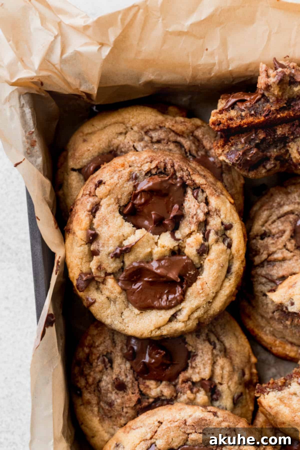 Decadent Peanut Butter Nutella Cookies 2 Close up of a large peanut butter Nutella cookie in a decorative box, highlighting its chewy texture and melted Nutella swirl.
