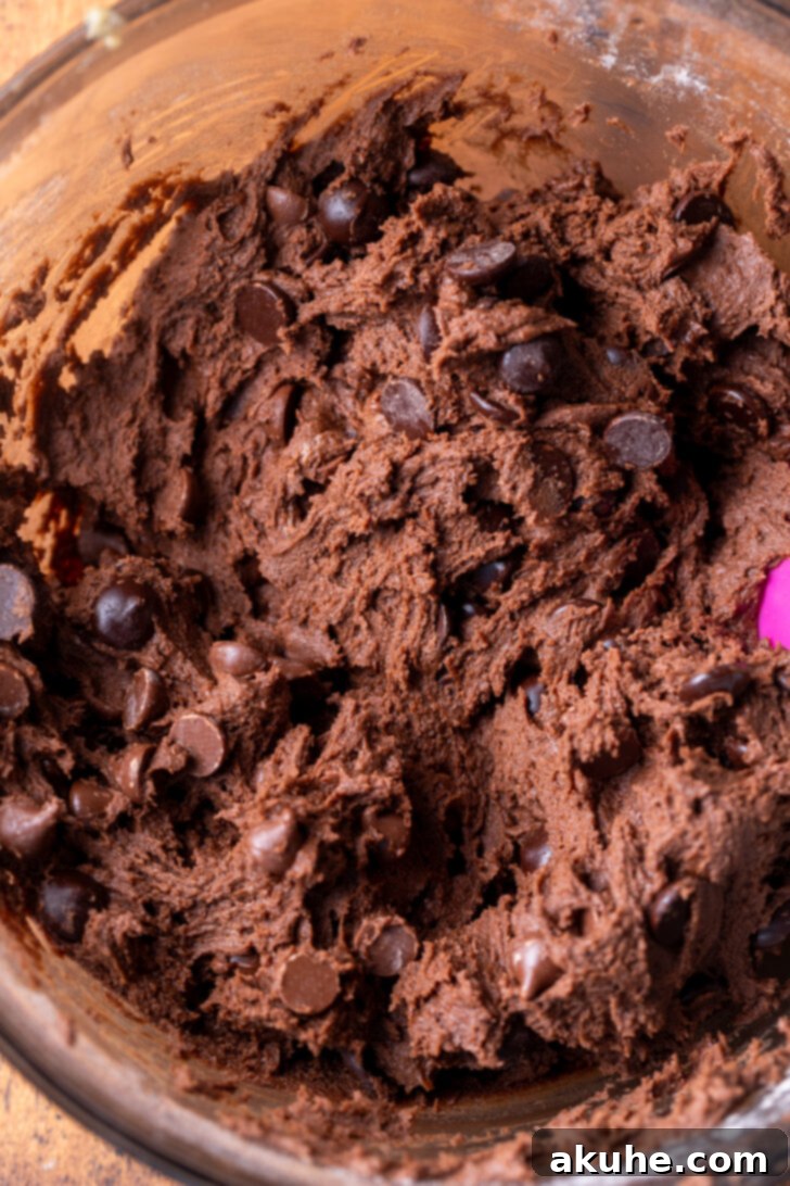 Triple Chocolate Chunk Cookies 5 Cookie dough in a bowl