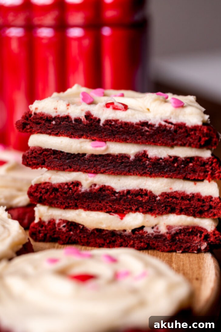 Red Velvet Cookie Delights 2 Stack of two red velvet cupcake cookies split in half.