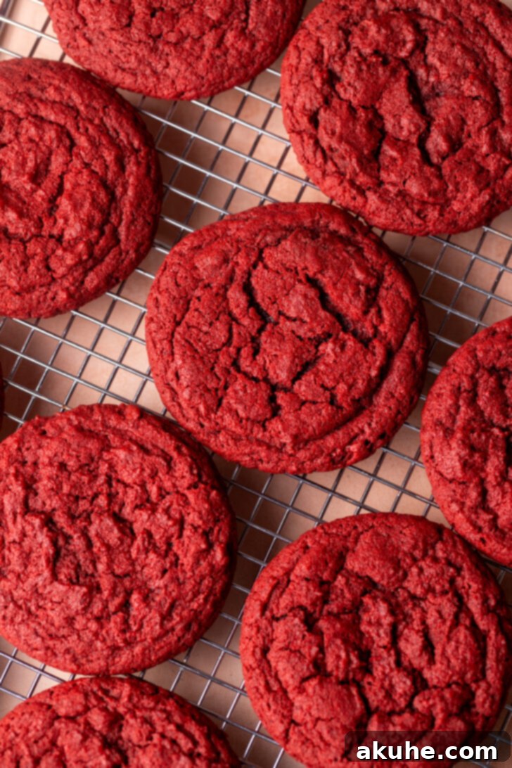 Red Velvet Cookie Delights 6 Top view of baked cookies on a wire rack.