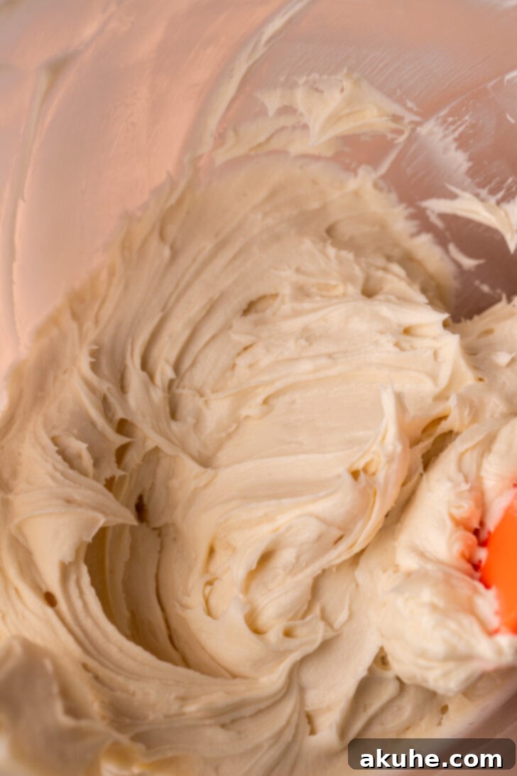 Red Velvet Cookie Delights 7 Cream cheese frosting in a bowl.