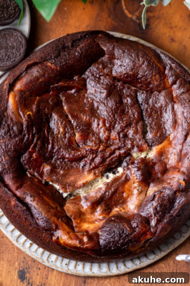 Oreo Dream Cheesecake 8 Baked Oreo cake cheesecake on a platter after chilling.