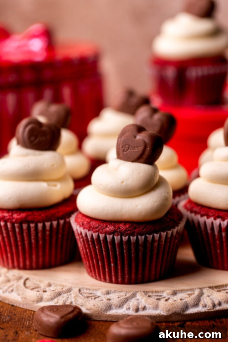 Red Velvet Delight 3 A platter of beautifully decorated red velvet cupcakes, ready to be enjoyed.