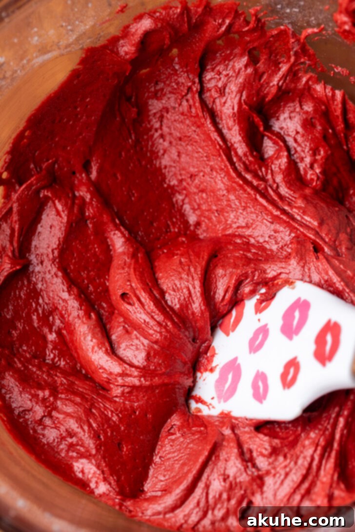 Red Velvet Delight 4 A bowl filled with smooth and creamy red velvet cake batter.
